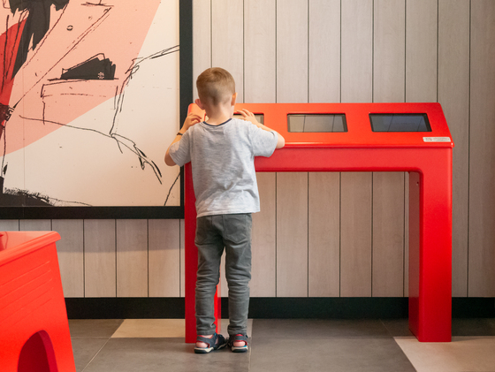 KFC Rocourt kids corner touchscreens